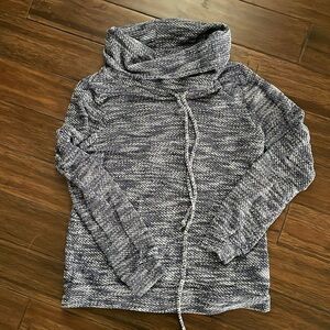 Blue and white sweater.